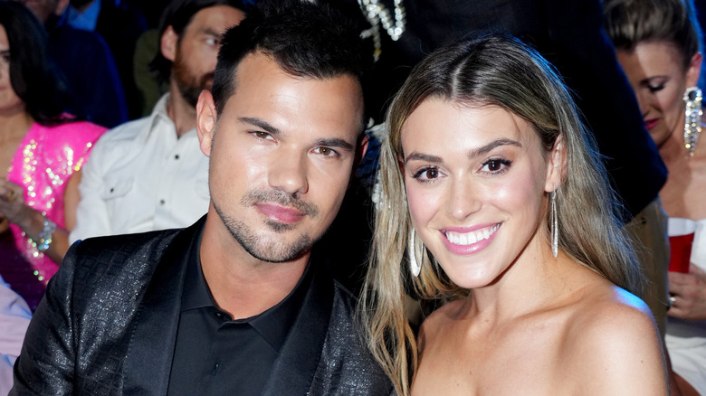 Taylor Lautner and Taylor Dome smiling