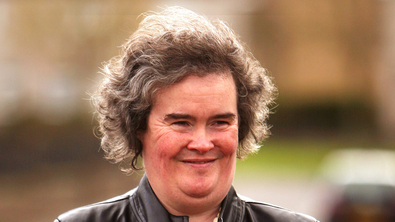 Susan Boyle curly gray hair smiling