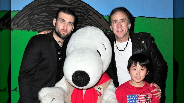 Weston Cage, Nicolas Cage, and Kal-el Cage posing