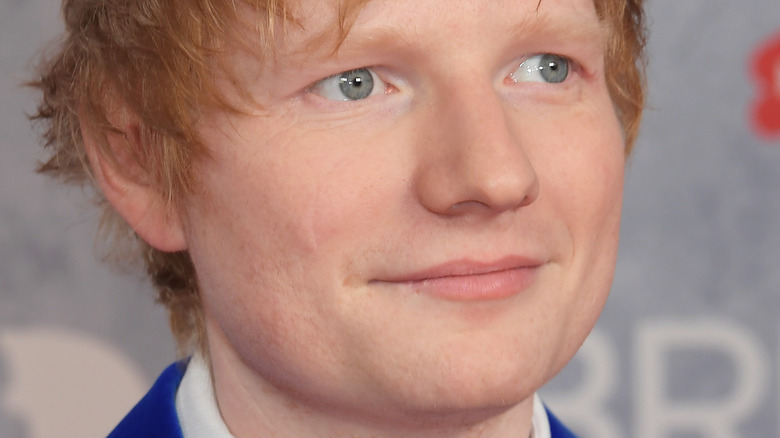 Ed Sheeran looking up