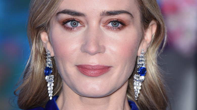 Emily Blunt wears diamond and sapphire dangle earrings