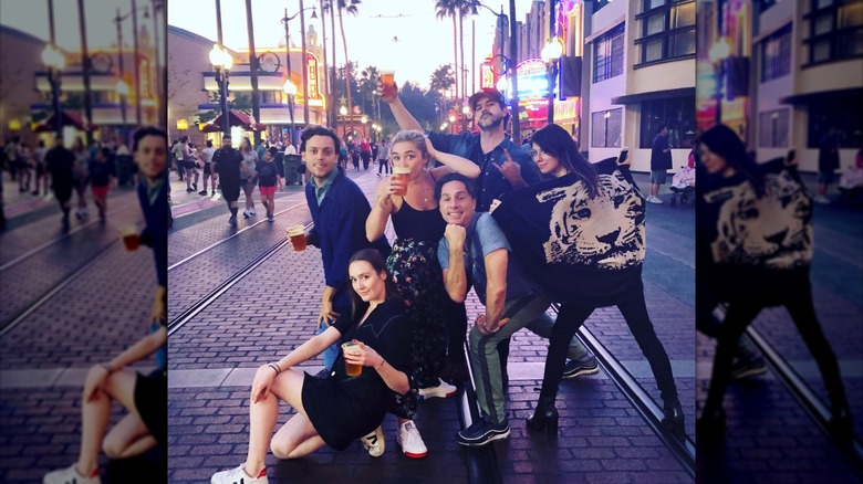 Florence Pugh and Zach Braff posing with friends