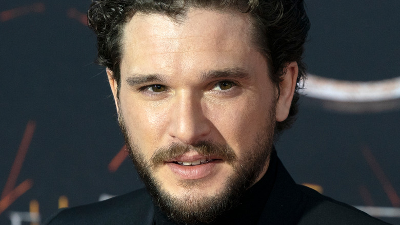 Kit Harington looking to the side with slight smile