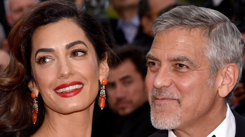 George and Amal Clooney smiling