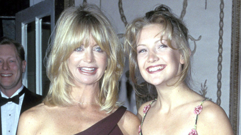 Goldie Hawn posing at event with daughter Kate Hudson