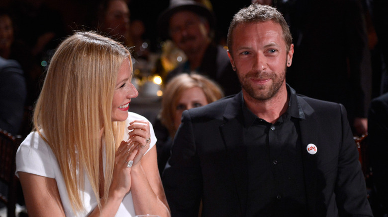 Gwyneth Paltrow laughing at Chris Martin