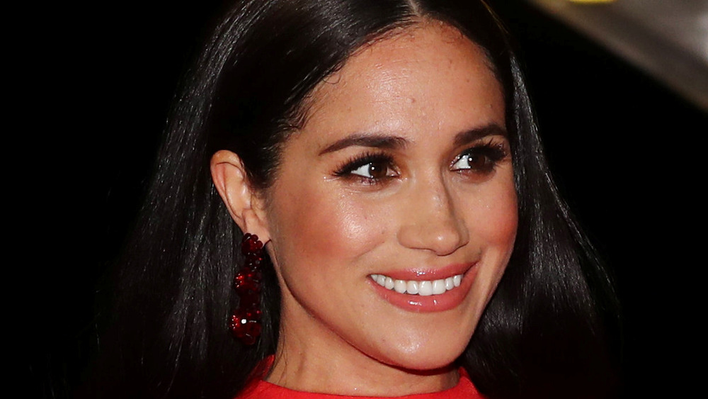 Meghan Markle wears red earrings