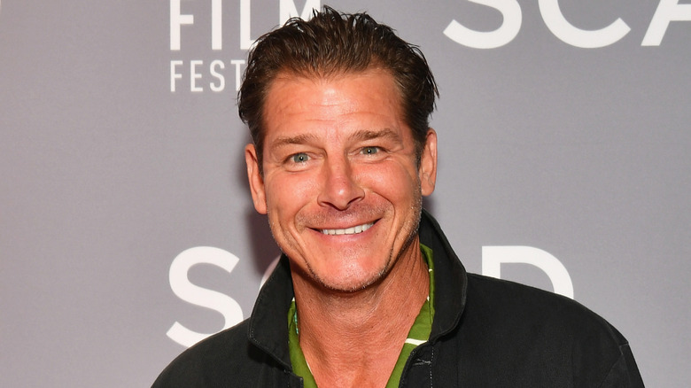 Ty Pennington on the red carpet with heavily gelled hair.