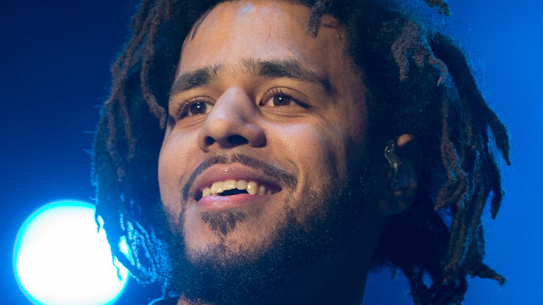 J. Cole smiling