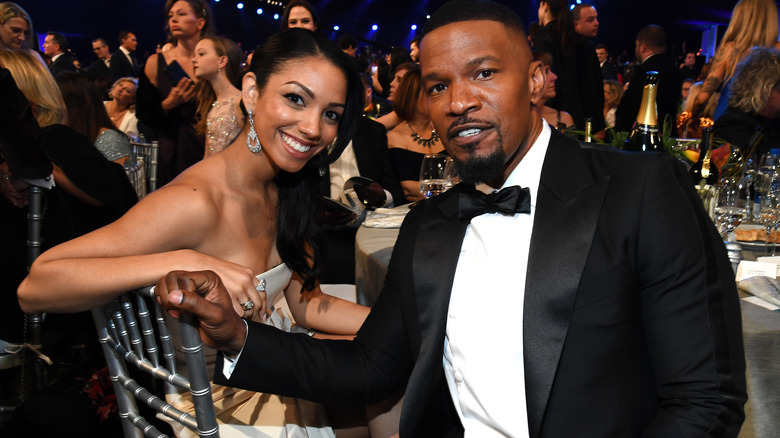Corinne Foxx and Jamie Foxx attending awards show