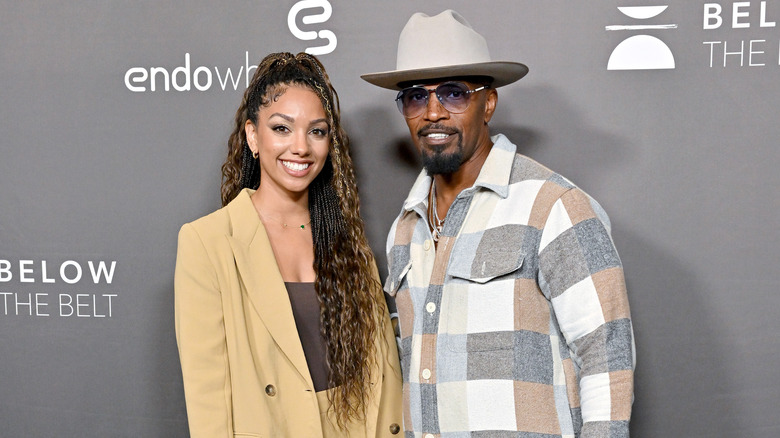 Corinne Foxx and Jamie Foxx attending screening