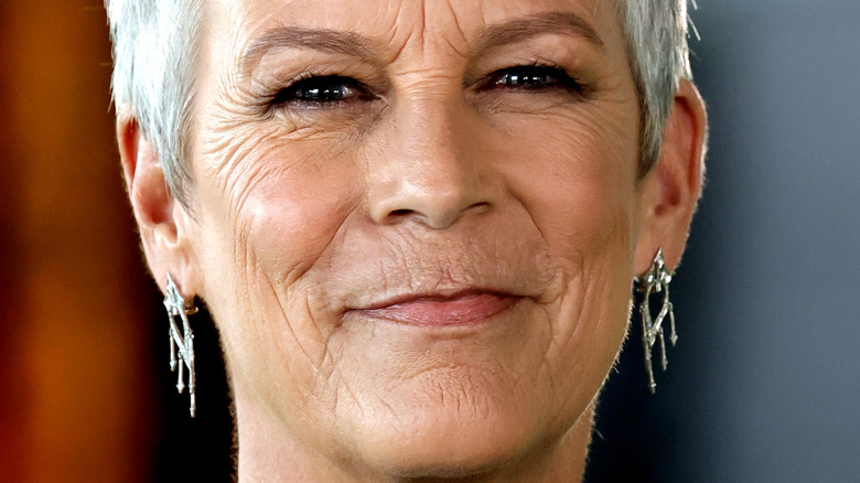 Jamie Lee Curtis grins at an event