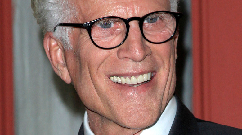 Ted Danson smiles on the red carpet