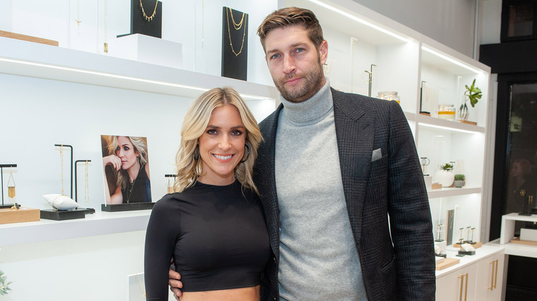 Kristin Cavallari and Jay Cutler smiling at Uncommon James store