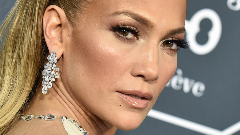 Jennifer Lopez with serious expression on the red carpet