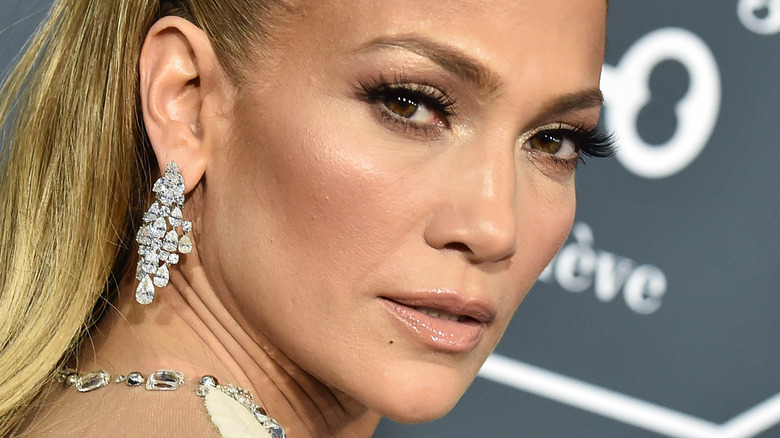 Jennifer Lopez with serious expression on the red carpet