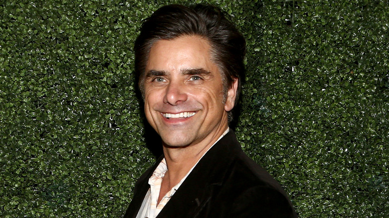 John Stamos smiling