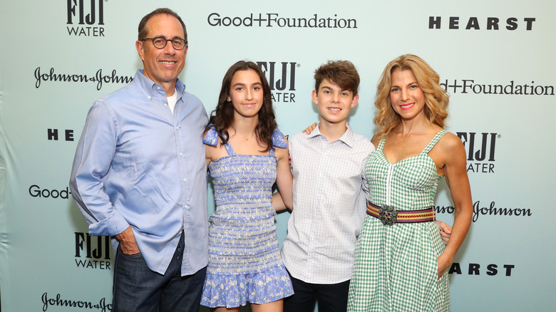 Jerry Seinfeld posing with his family