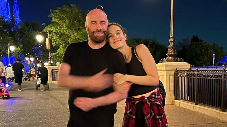 John and Ella Travolta pose in Disneyland