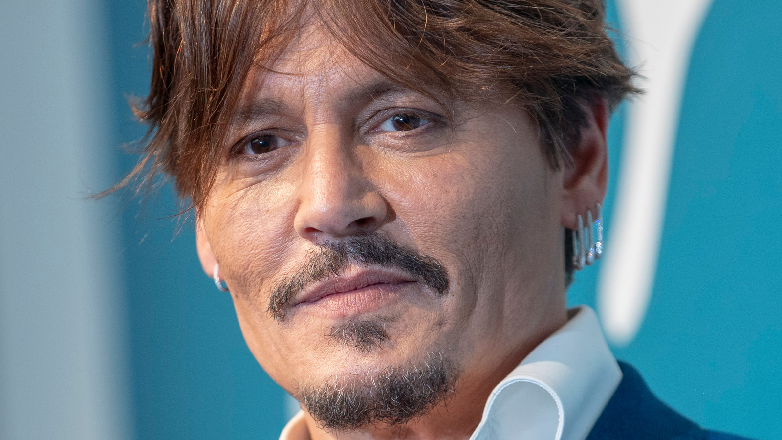 How Johnny Depp Covered Up His Winona Ryder Tattoo