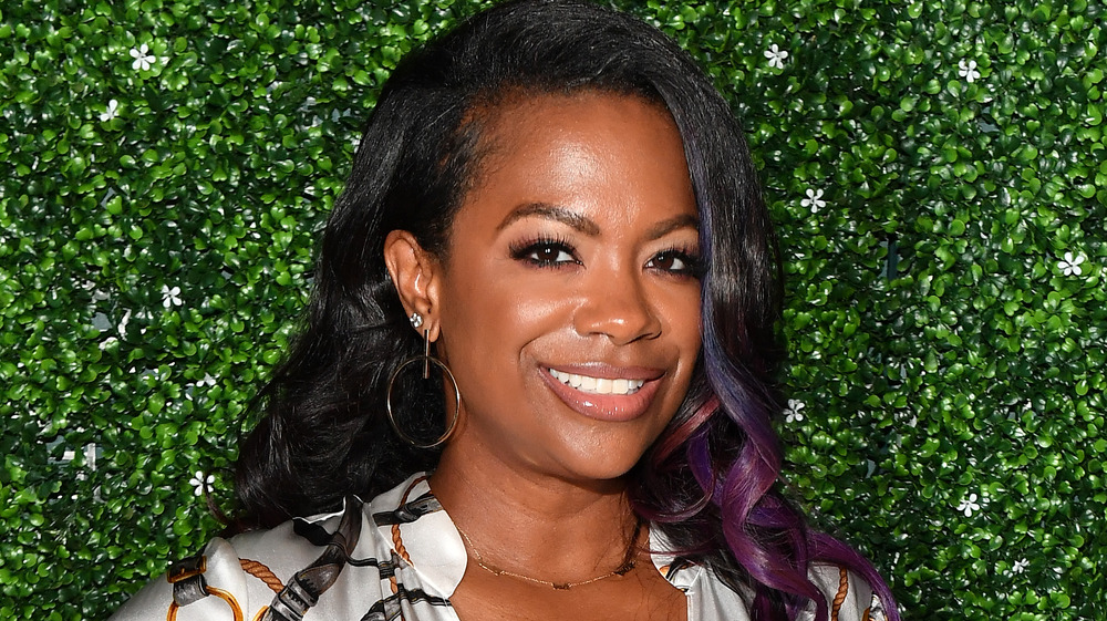 Kandi Burruss smiling