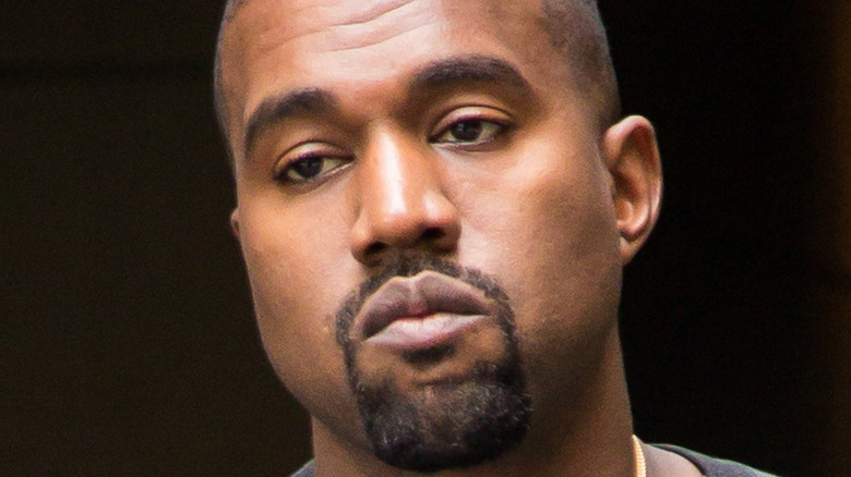 Kanye West not smiling