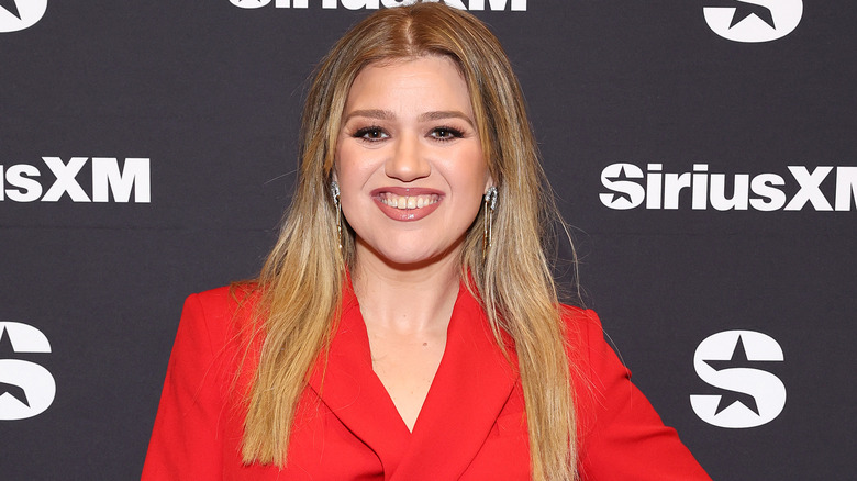 Kelly Clarkson red suit