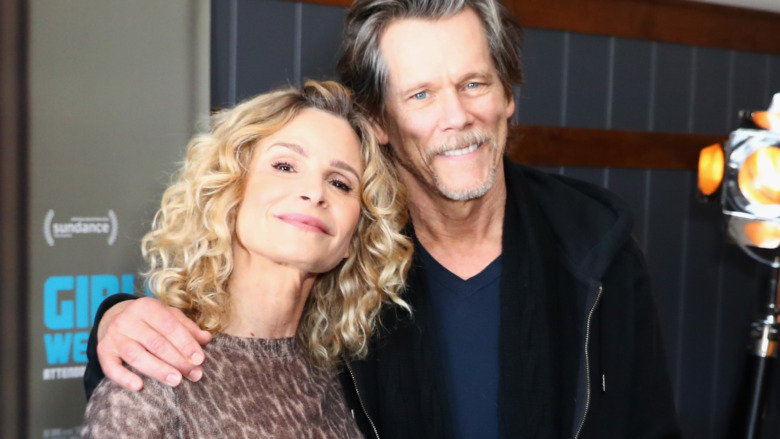 Kyra Sedgwick and Kevin Bacon posing