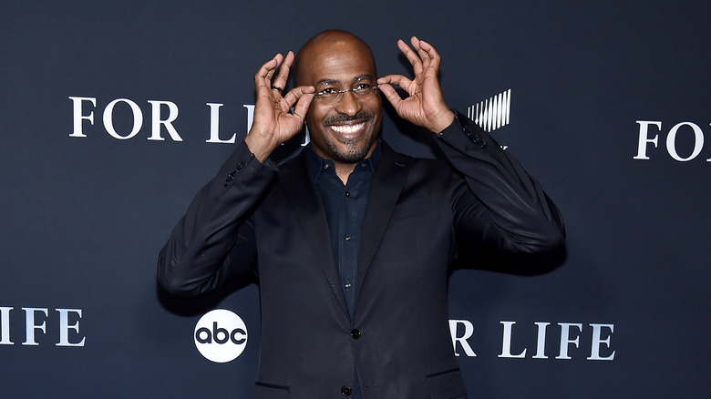 Van Jones touching his glasses