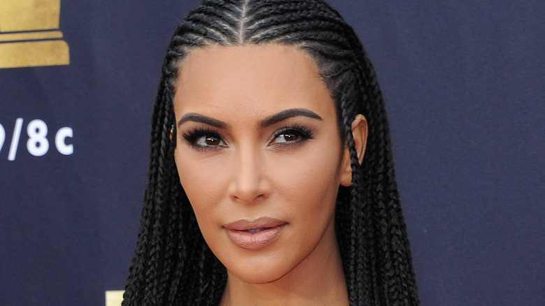 Kim Kardashian smiles at an event