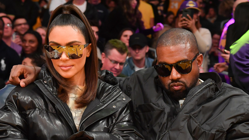 Kim Kardashian and Kanye West at a Laker's game