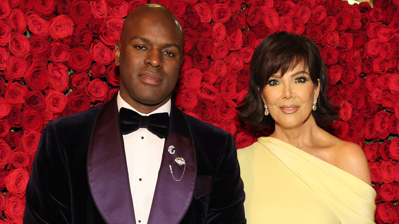Kris Jenner and Corey Gamble posing