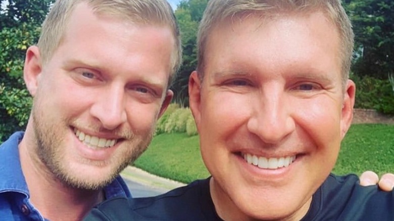 Kyle and Todd Chrisley smile for a selfie