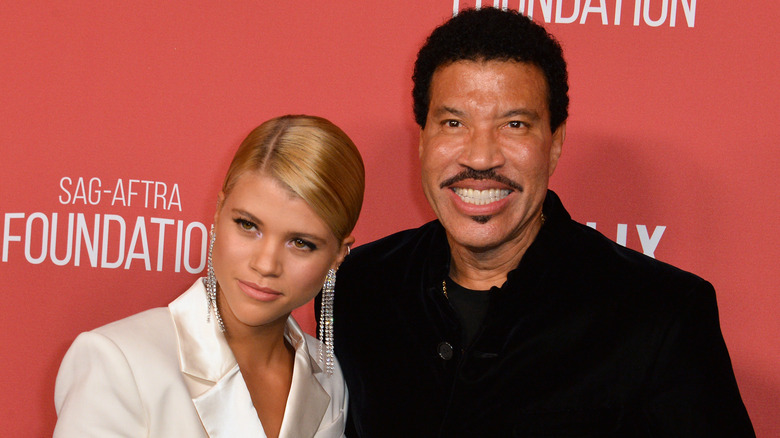 Lionel and Sofia Richie smiling