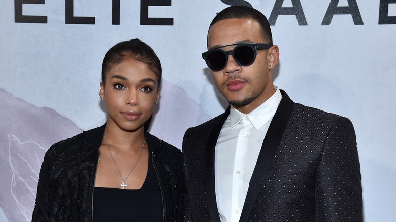 Lori Harvey posing with Memphis Depay