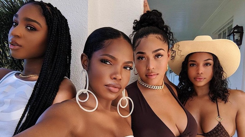 Lori Harvey posing with friends