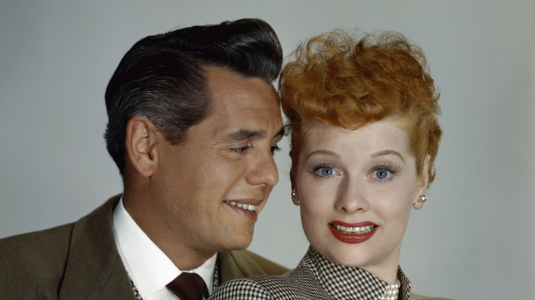 Desi Arnaz looks lovingly at a smiling Lucille Ball