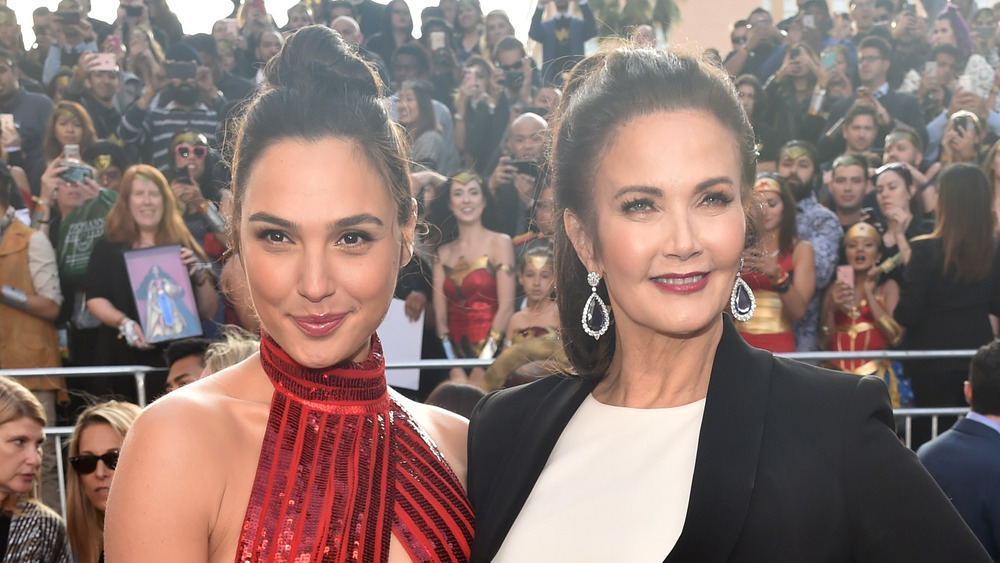 Gal Gadot and Lynda Carter smile for cameras next to each other