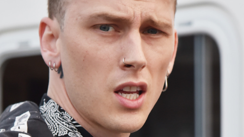 Machine Gun Kelly makes a funny face.