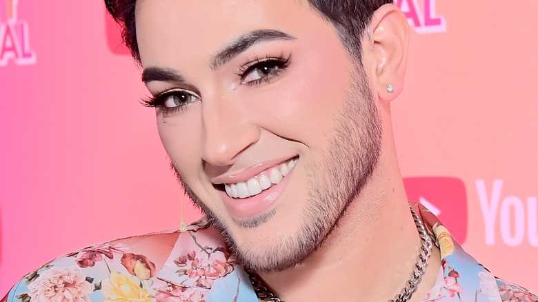 Manny MUA smiling