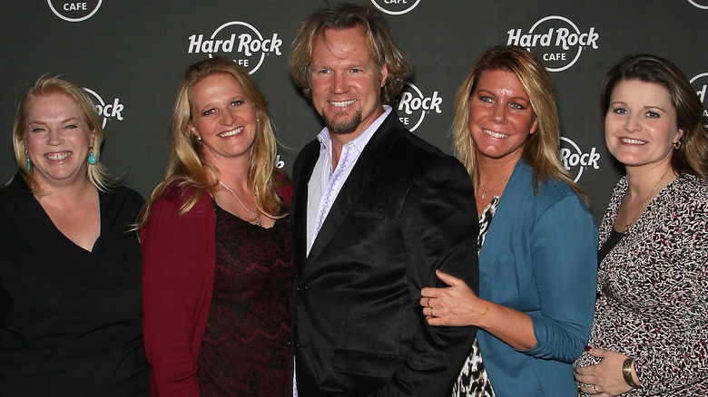 Kody Brown smiling with wives