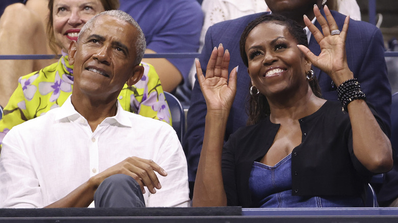 Michelle and Barack Obama pictured side-by-side at the US Open.