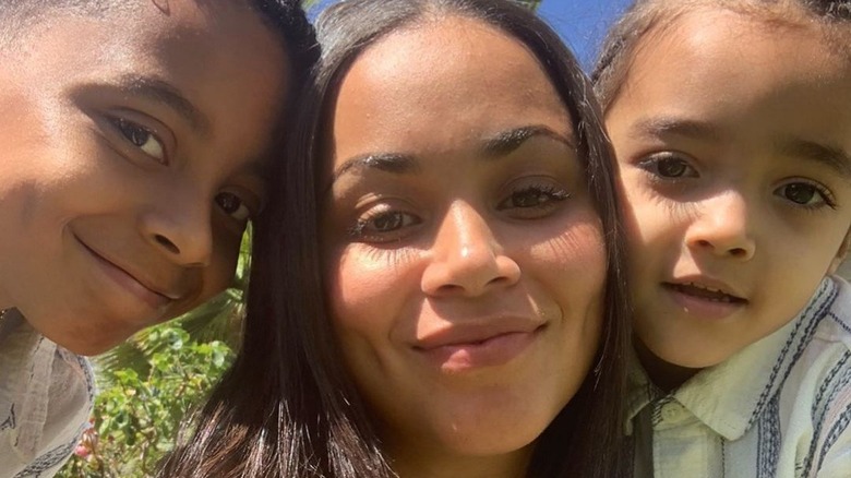 Lauren London posing with sons