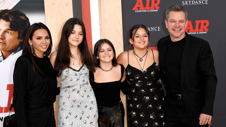 Matt Damon poses with his wife and three of their daughters