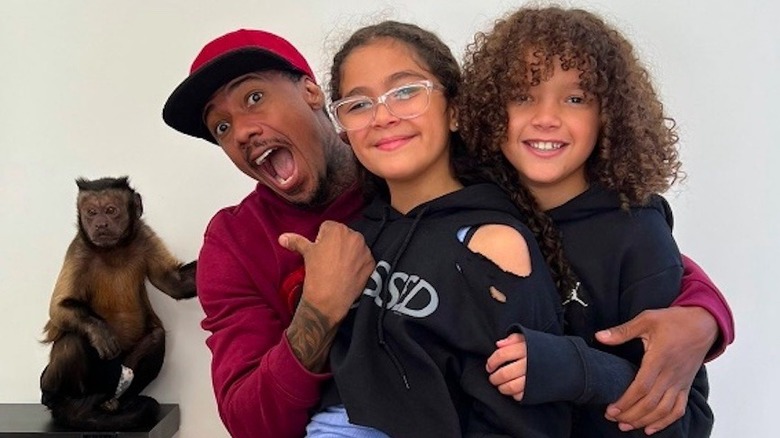 Nick Cannon with twins Monroe and Morocco