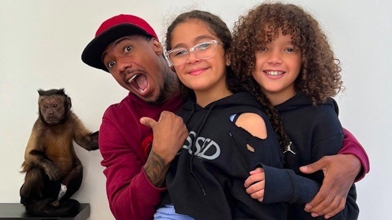 Nick Cannon with twins Monroe and Morocco