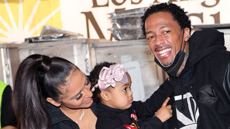 Brittany Bell, Powerful Queen Cannon, and Nick Cannon, 
