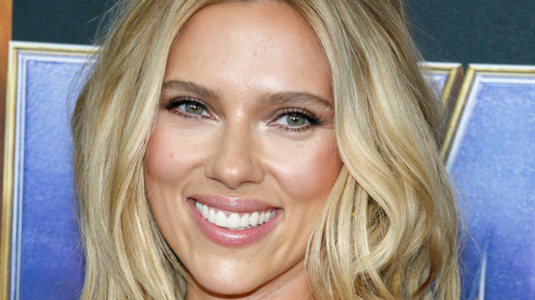 Scarlett Johansson smiles on the red carpet