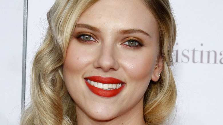 Scarlett Johansson smiles on the red carpet