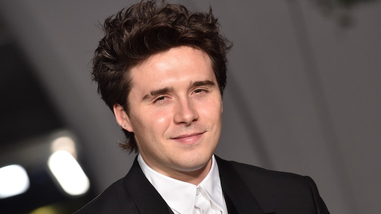 Brooklyn Beckham smiling